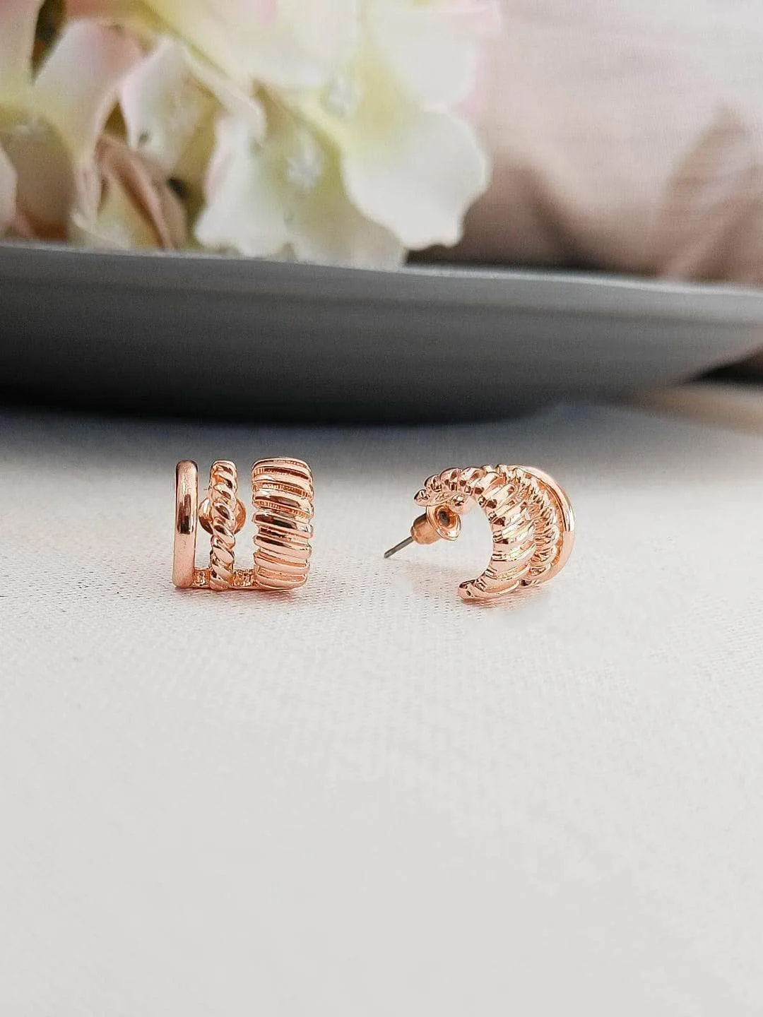Shriya Saran In 3 Line Twist Stud Earrings